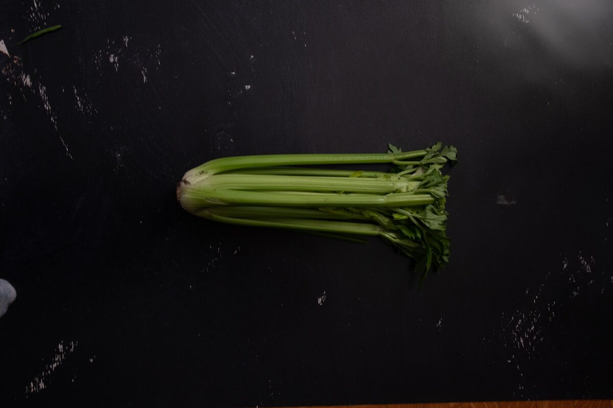 green vegetable on black table